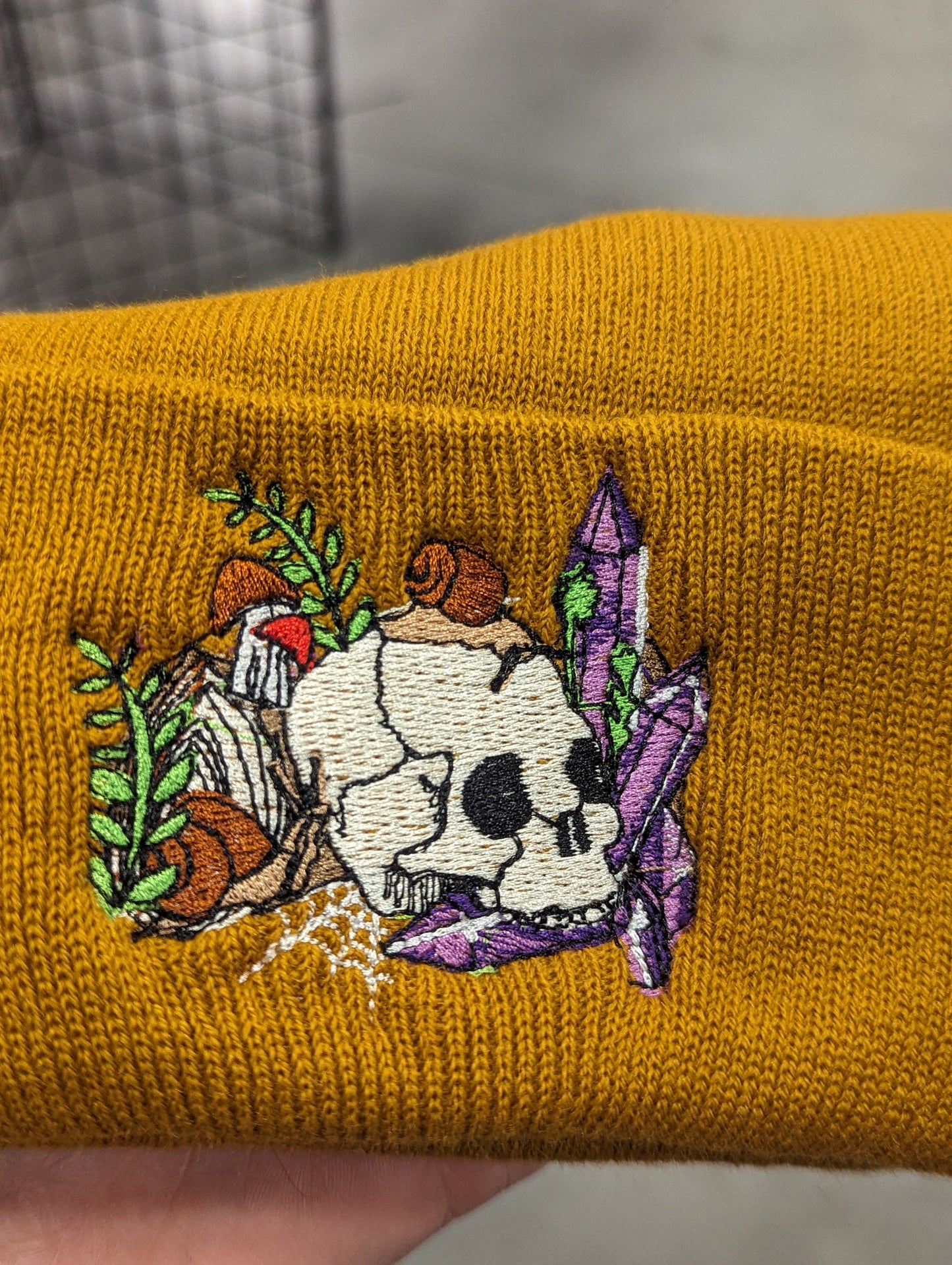 Skulls and snails embroidered Beanie