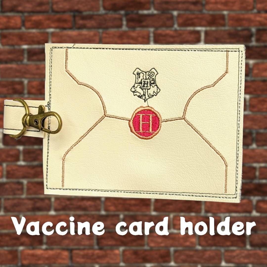 Magic school acceptance letter vaccination card protector. Attach to purse, bag, backback or beltloops Vinyl, cork, leather.