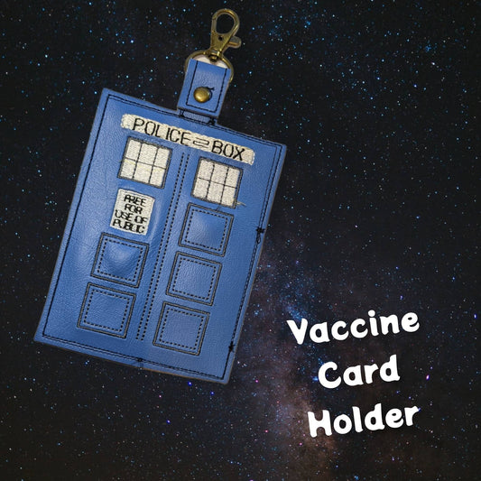Space Dr. vaccination card protector. Space for valuables. Attach to purse, bag, backback or beltloops Vinyl, cork, leather.