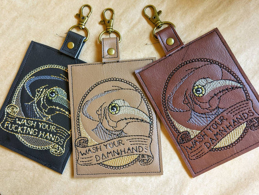 Plague doctor vaccination card protector,space for valuables. Easily Attach to purse, bag, backback or beltloops. Vinyl, cork, leather.
