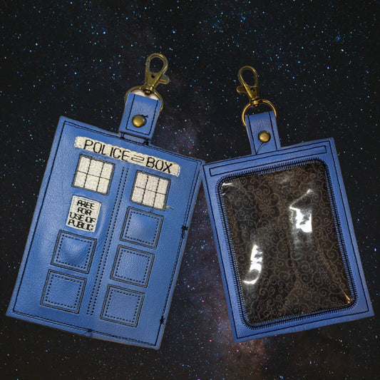 Space Dr. vaccination card protector. Space for valuables. Attach to purse, bag, backback or beltloops Vinyl, cork, leather.