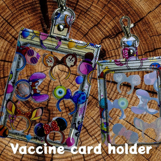 Clear addition!! vaccination card protector. Attach to purse, bag, backback or beltloops Vinyl, cork, leather.