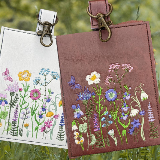 Wildflower vaccination card protector. Attach to purse, bag, backback or beltloops Vinyl, cork, leather.