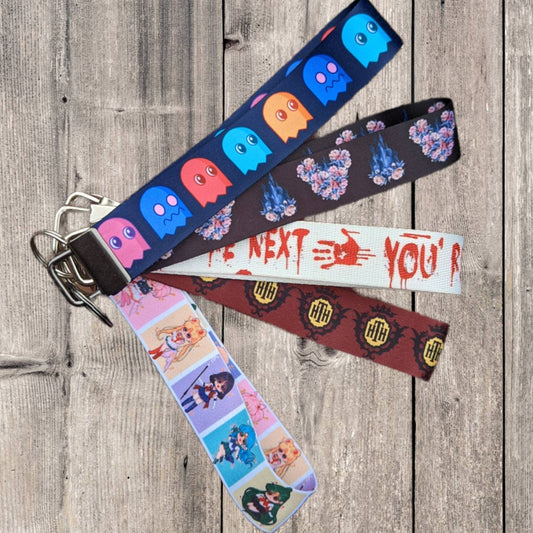 Printed keyfob wristlets and lanyards, geeky, horror and fun. Custom sized available. Badge holder. Con lanyard