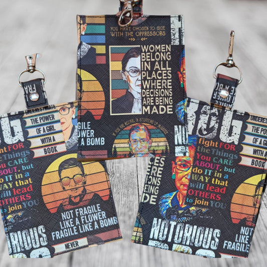 The Notorious RBG vaccine card protector. Attach to purse, bag, backpack or beltloops Vinyl, vegan leather.