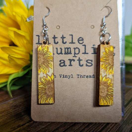 Hand painted sunflower bar shaped wooden hanger earrings. Mother's day gift spring flowers