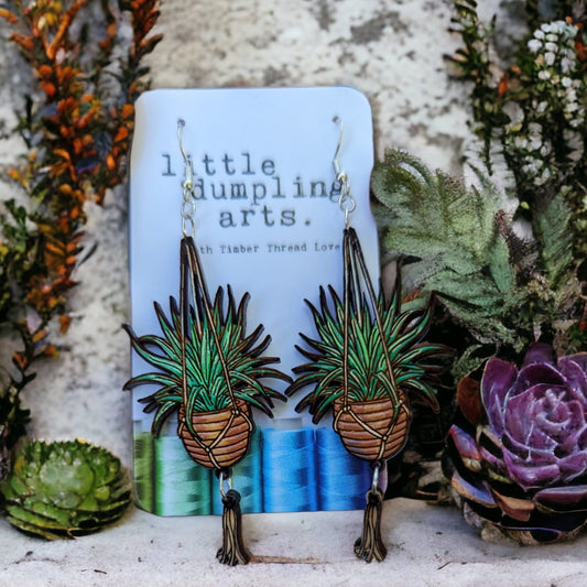 Hand painted hanging plant jointed earrings. Sterling silver hardware