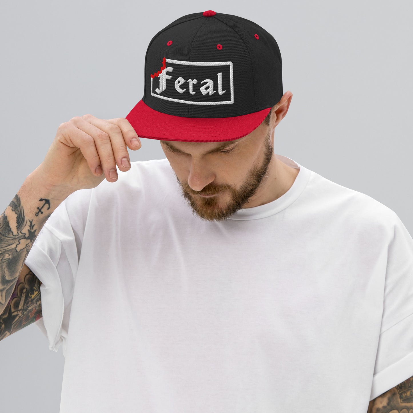 feral snap back hat