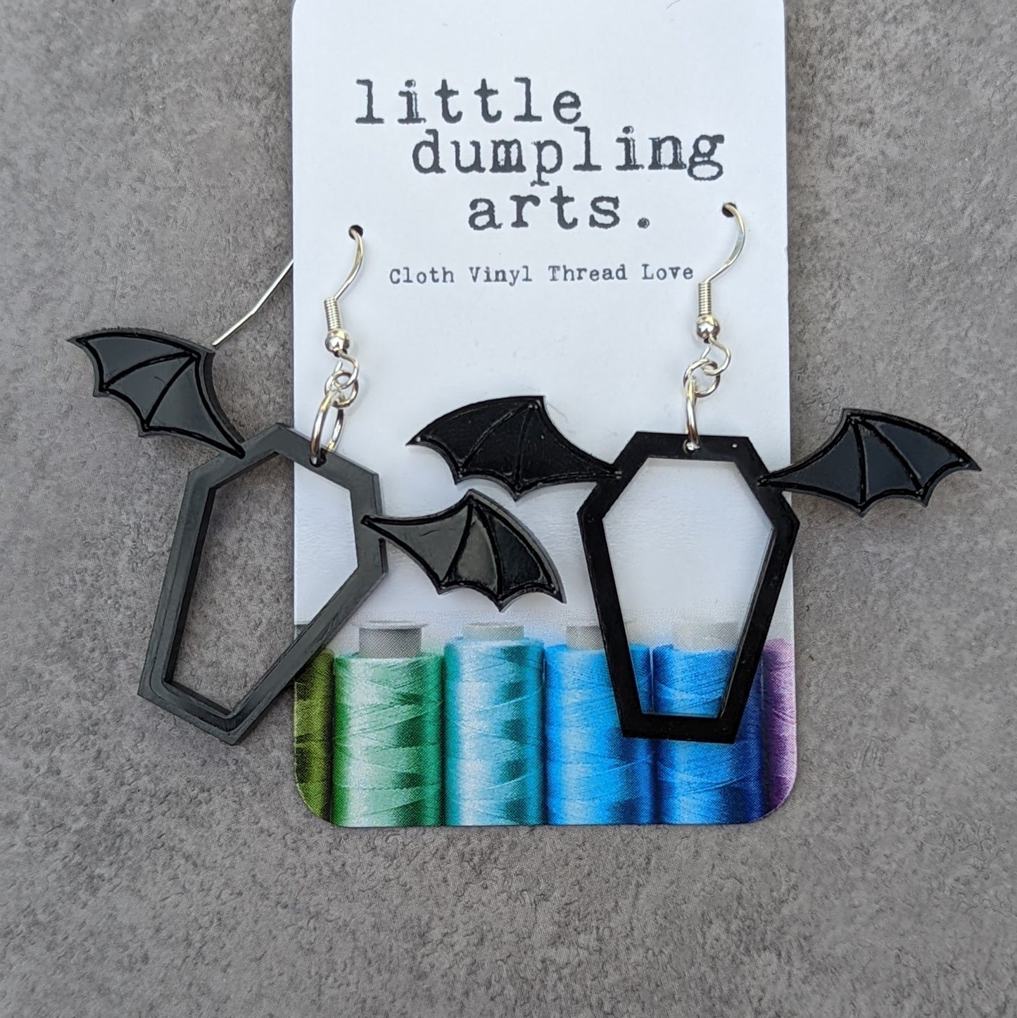 Batwing coffin earrings