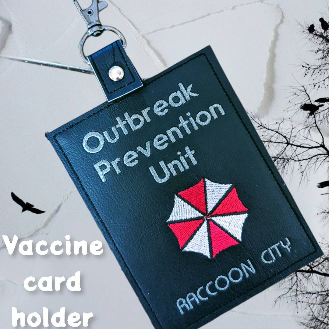 Zombie outbreak vaccination card protector. Space for valuables. Attach to purse, bag, backback or beltloops