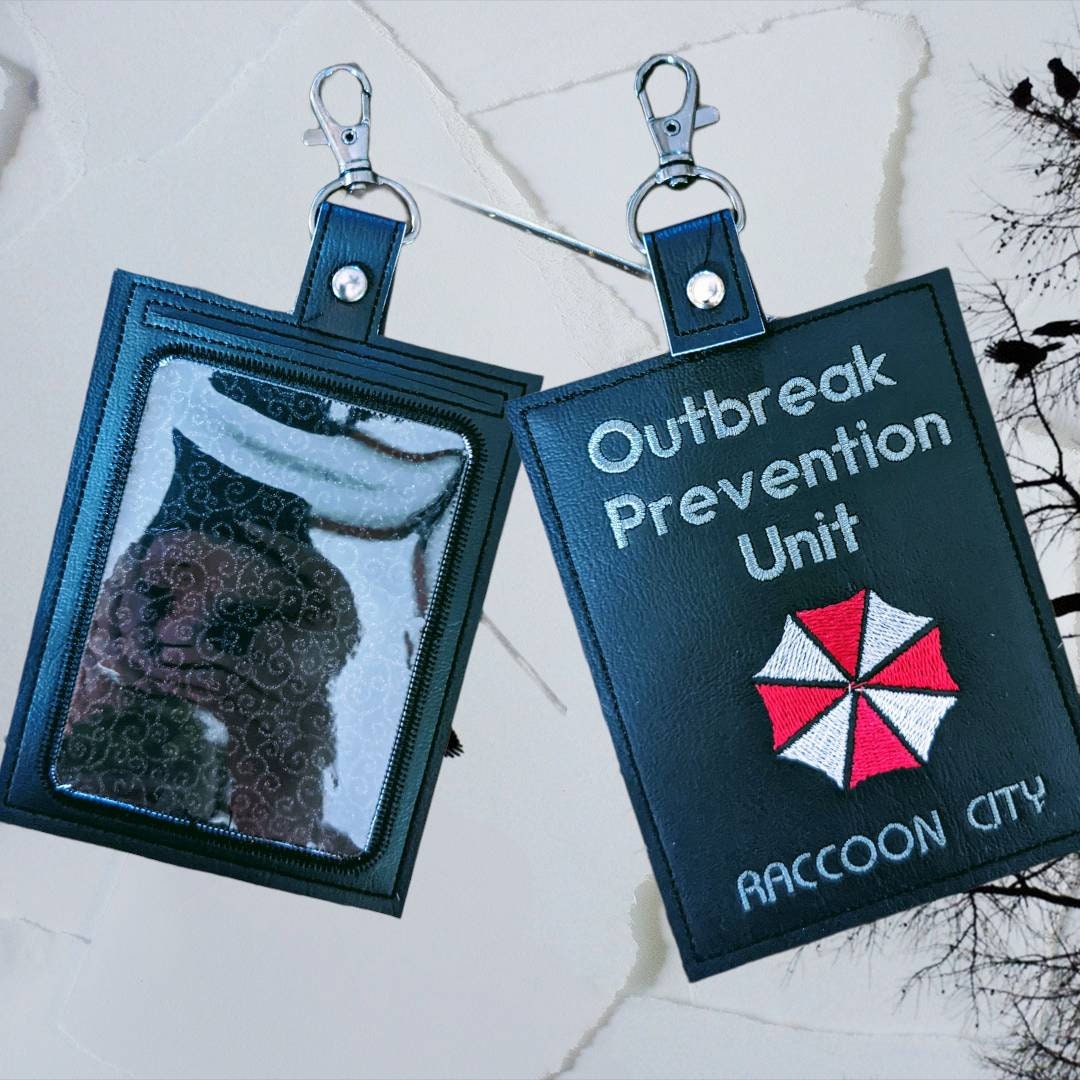Zombie outbreak vaccination card protector. Space for valuables. Attach to purse, bag, backback or beltloops