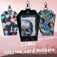 Coffin vaccination card protector. Space for valuables. Attach to purse, bag, backback or beltloops Vinyl, cork, leather.